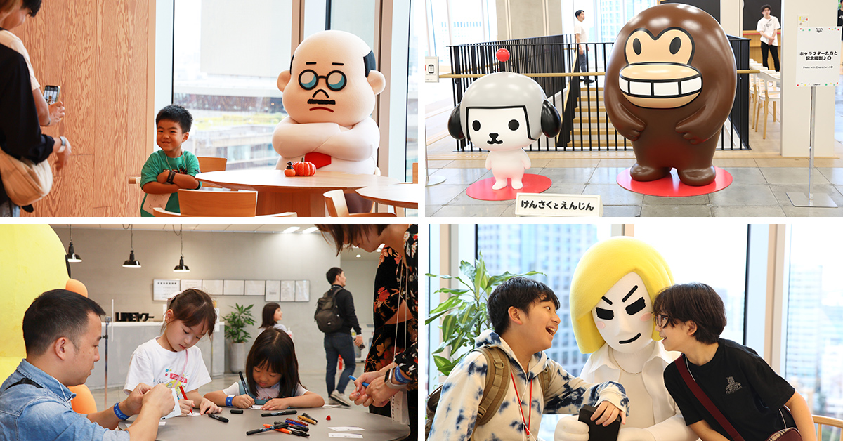 子供たちがキャラクターの前で楽しそうに遊んでいます。親子で楽しい時間を過ごしています。