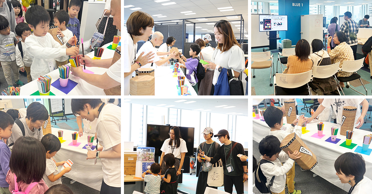 子供たちがカラフルなペンを使って創作活動をしています。親子で参加する楽しいイベントです。